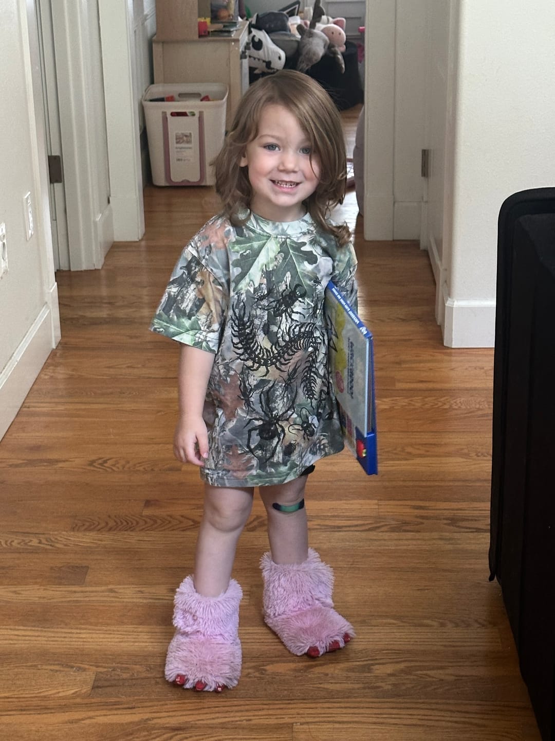 Customer photo review of Kids Camo Bug Oversized Tee