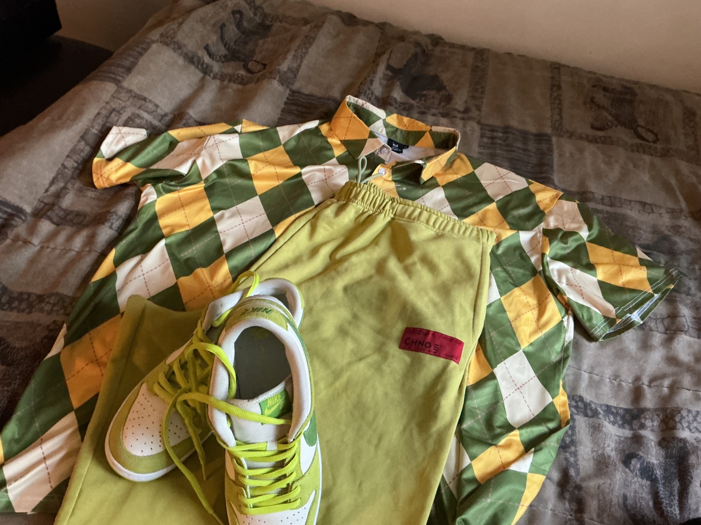 Men's Yollow Argyle Polo golf outfit inspiration from Golf Gentry