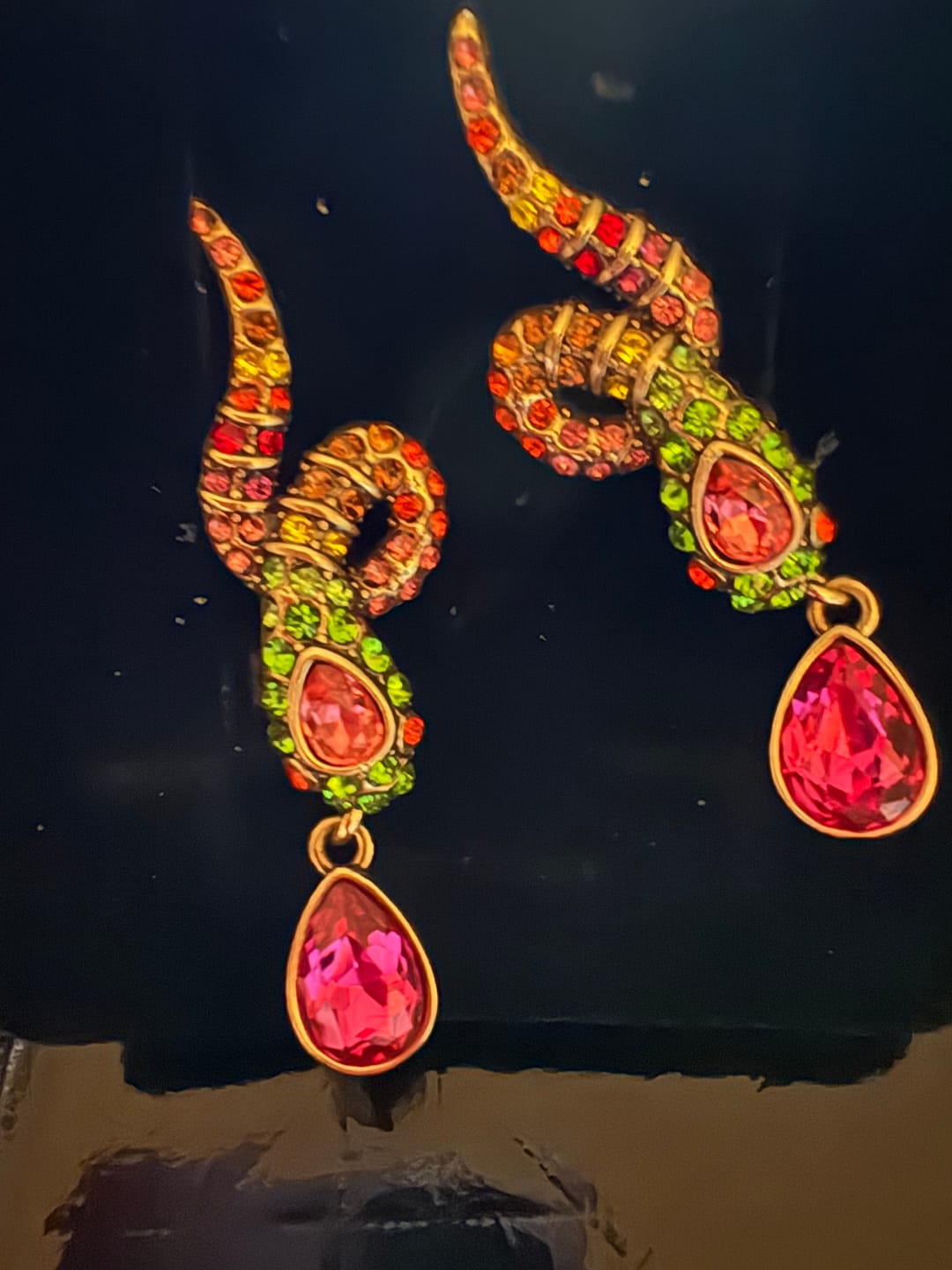 Customer photo review of HEIDI DAUS®"Gorgeous Glimmer Snake" Crystal Snake Dangle Earrings