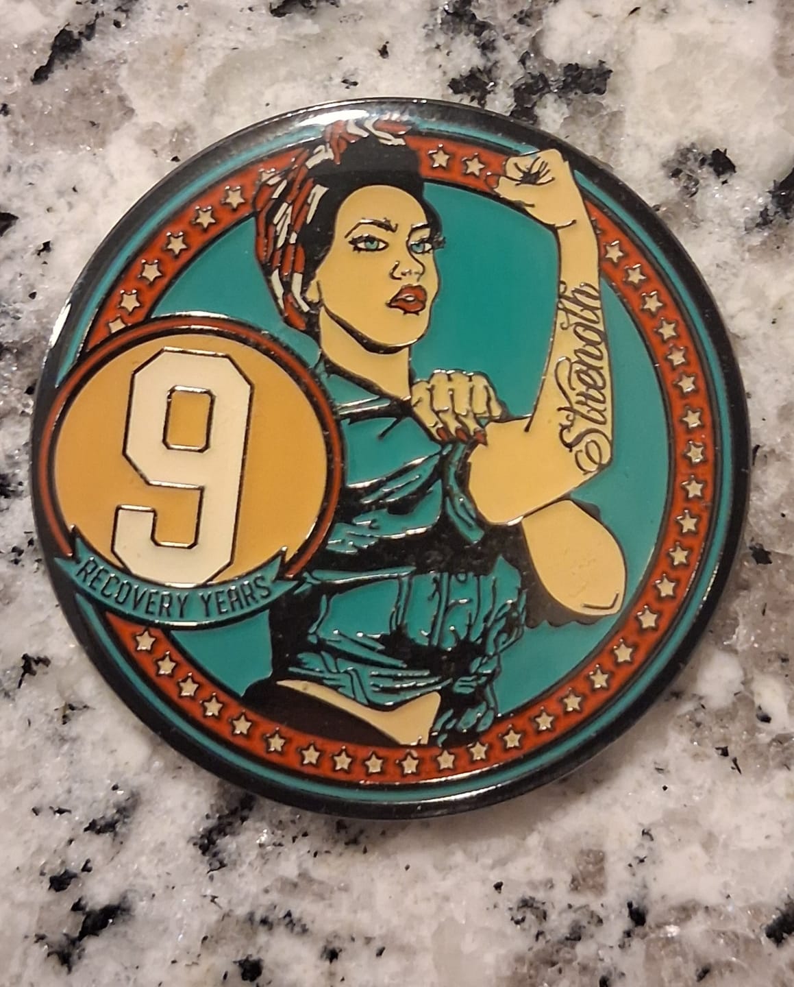 Customer photo review of Rosie Recovery Strength 9 Year AA/NA Medallion - Tri-Plate Nine Year Chip/Coin