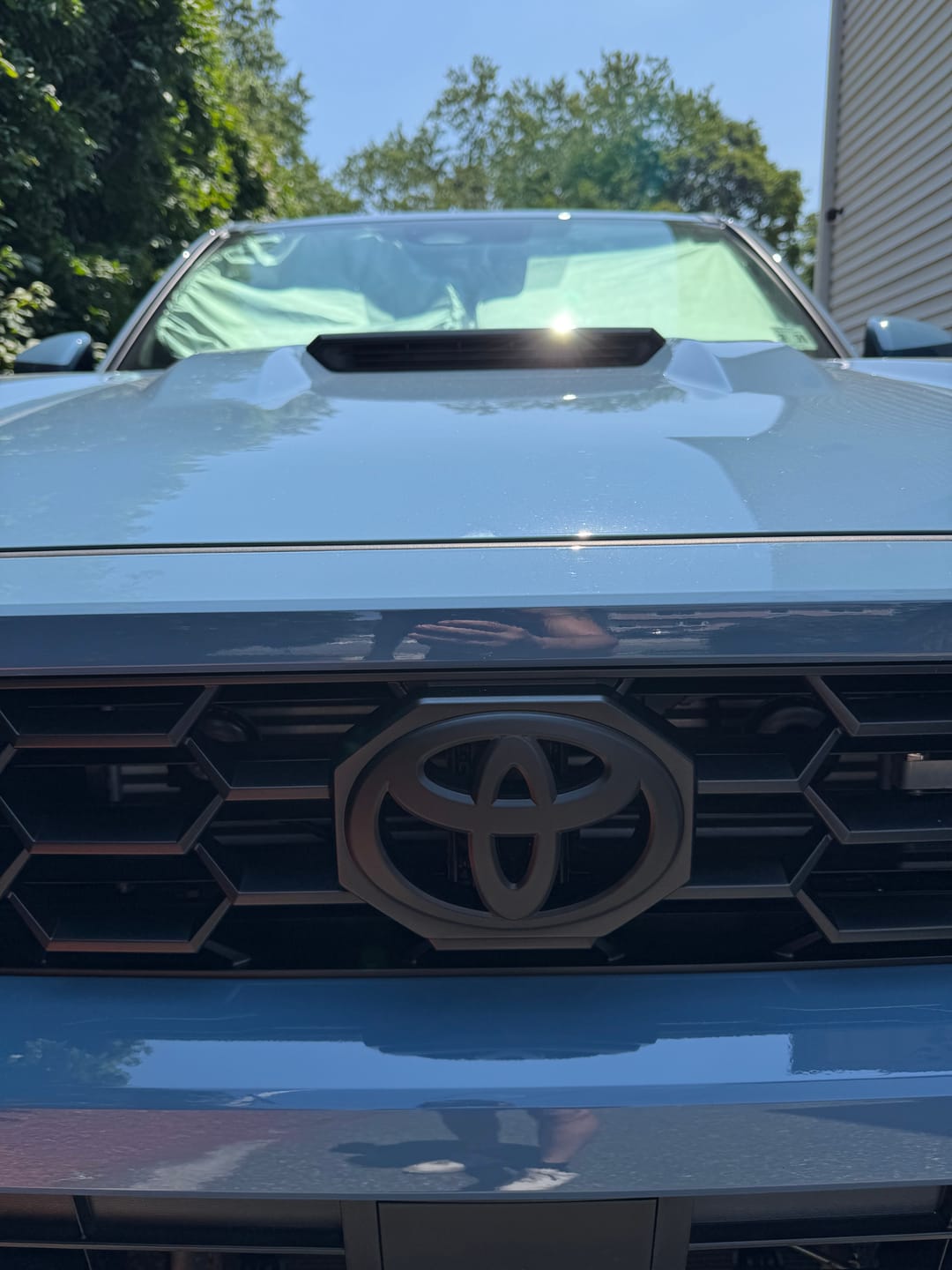 Customer photo review of NEW 2025-2026 4Runner Matte Blackout Overlay Front Grille Emblem