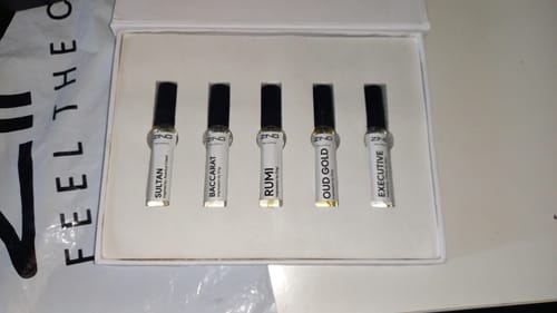Customer's Make Your Own Tester Pack, showing five labeled fragrance vials inside a white display box.