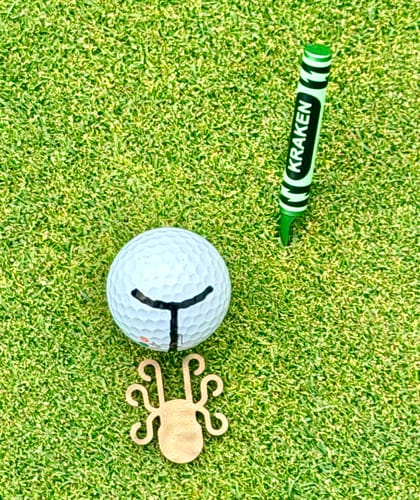 Customer photo review of Kraken Logo Ball Marker - Brass Damascus