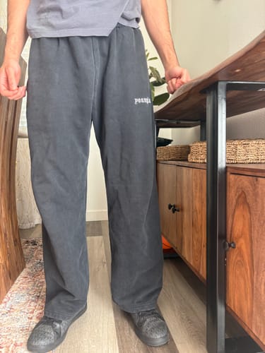 Customer's YoungLA Classic Baggy Sweats, featuring a relaxed dark gray fit with a subtle white logo.