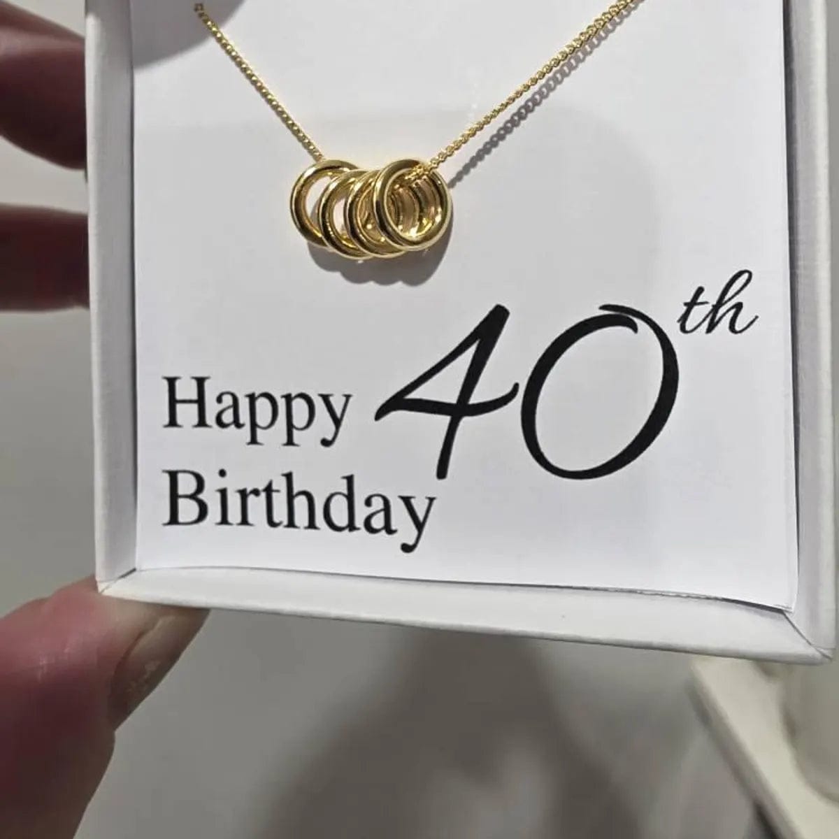 Customer photo review of Tiny Rings Necklace