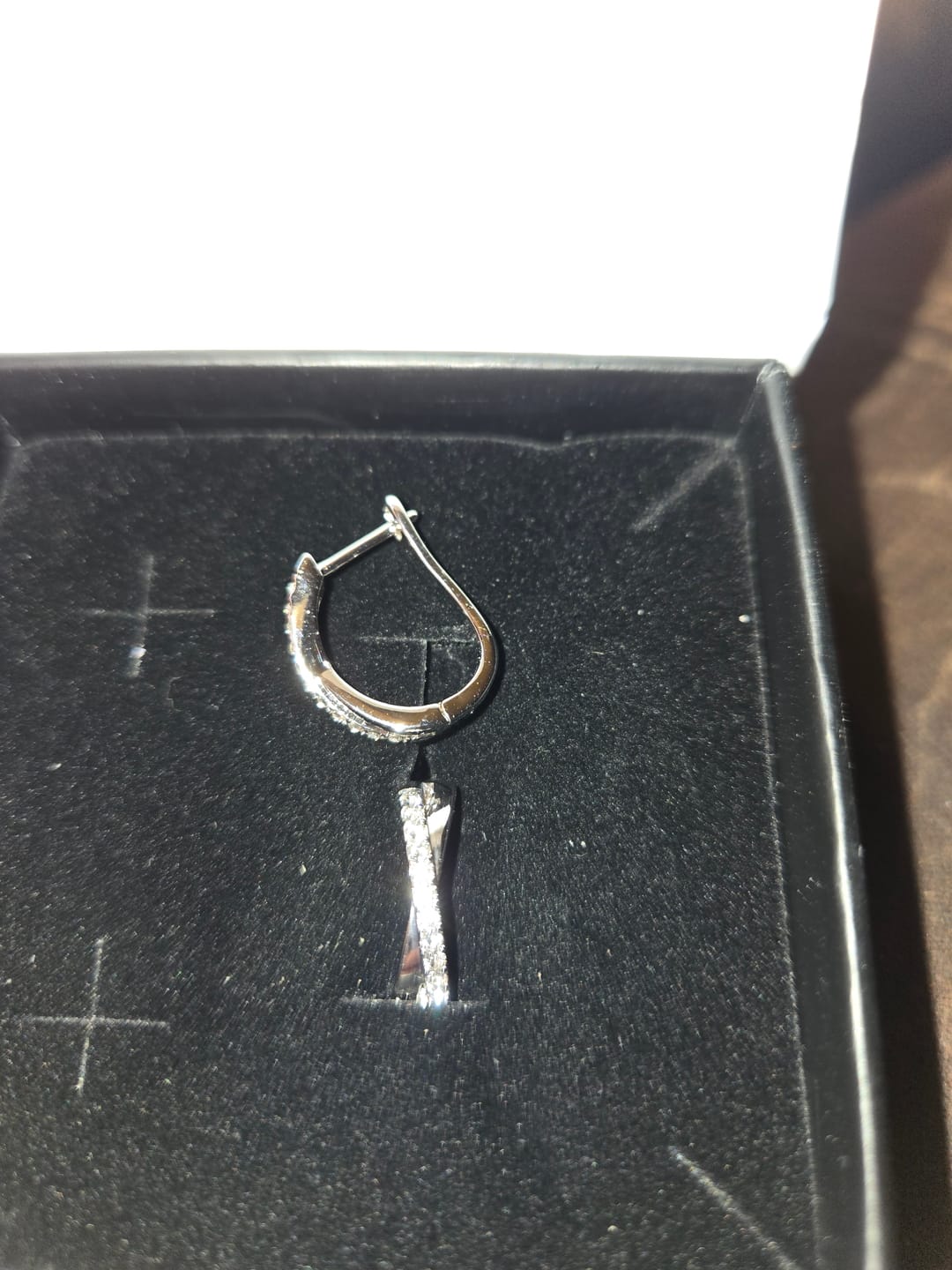 Customer photo review of Amaya 18k White Gold Plated 16mm Twisted Hoop Earrings with Swarovski Crystals
