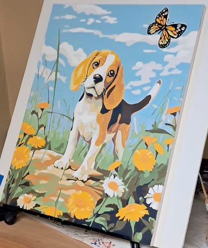 Reviewer's Beagles Buddy paint by numbers showing a beagle in a flowery meadow with a butterfly above.