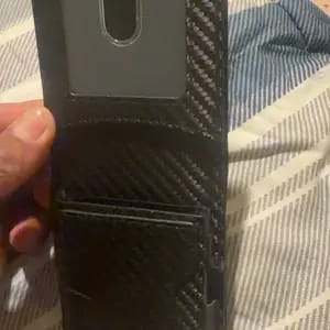 Customer photo review of VaultGuard™ Leather RFID Pop-Up Wallet