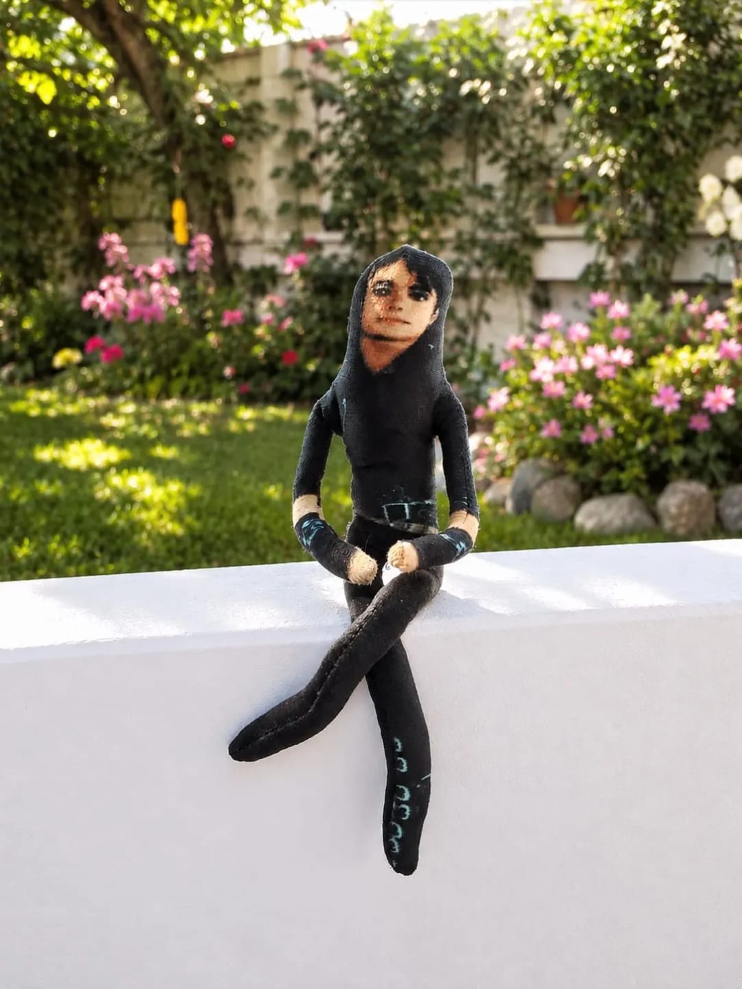 Customer photo review of Mini Michael Doll Plush
