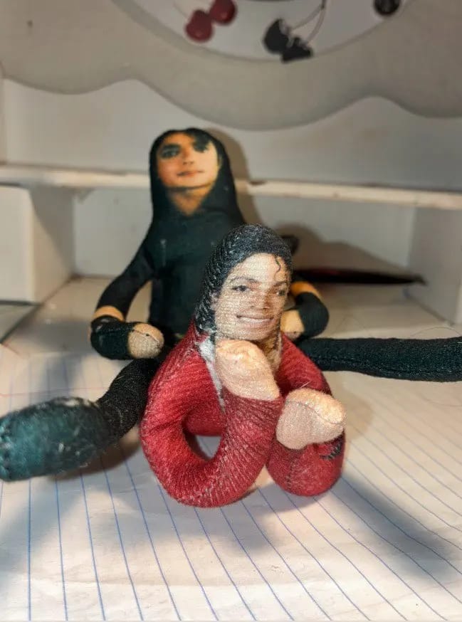 Customer photo review of Mini Michael Doll Plush
