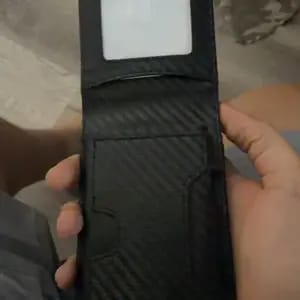 Customer photo review of VaultGuard™ Leather RFID Pop-Up Wallet