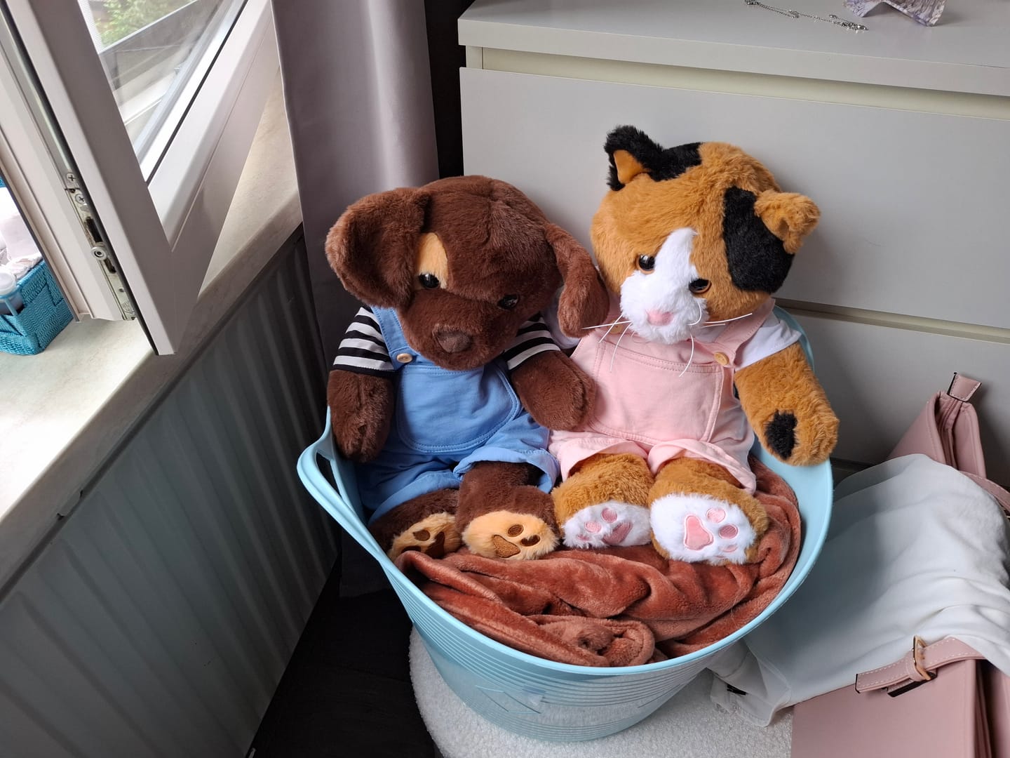 Customer photo review of Troostmaatje Kledingbundel Roze & Blauw
