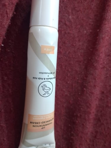Customer's Advance Lip Pigmentation Cream tube, angled close-up view showing the packaging and branding.