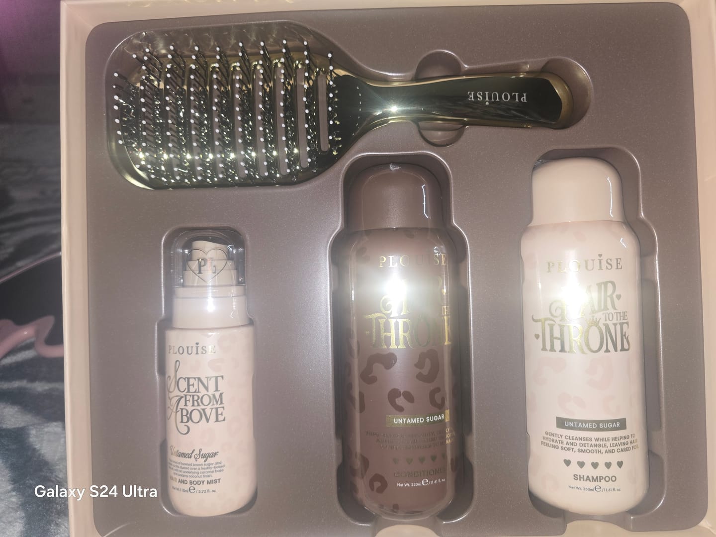 Customer photo review of Cheetah Claim To Tame Hair Care Set