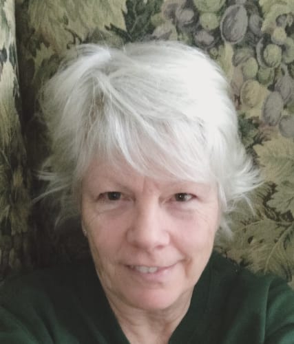 Reviewer showing soft, bright white hair achieved with Purple Shampoo.