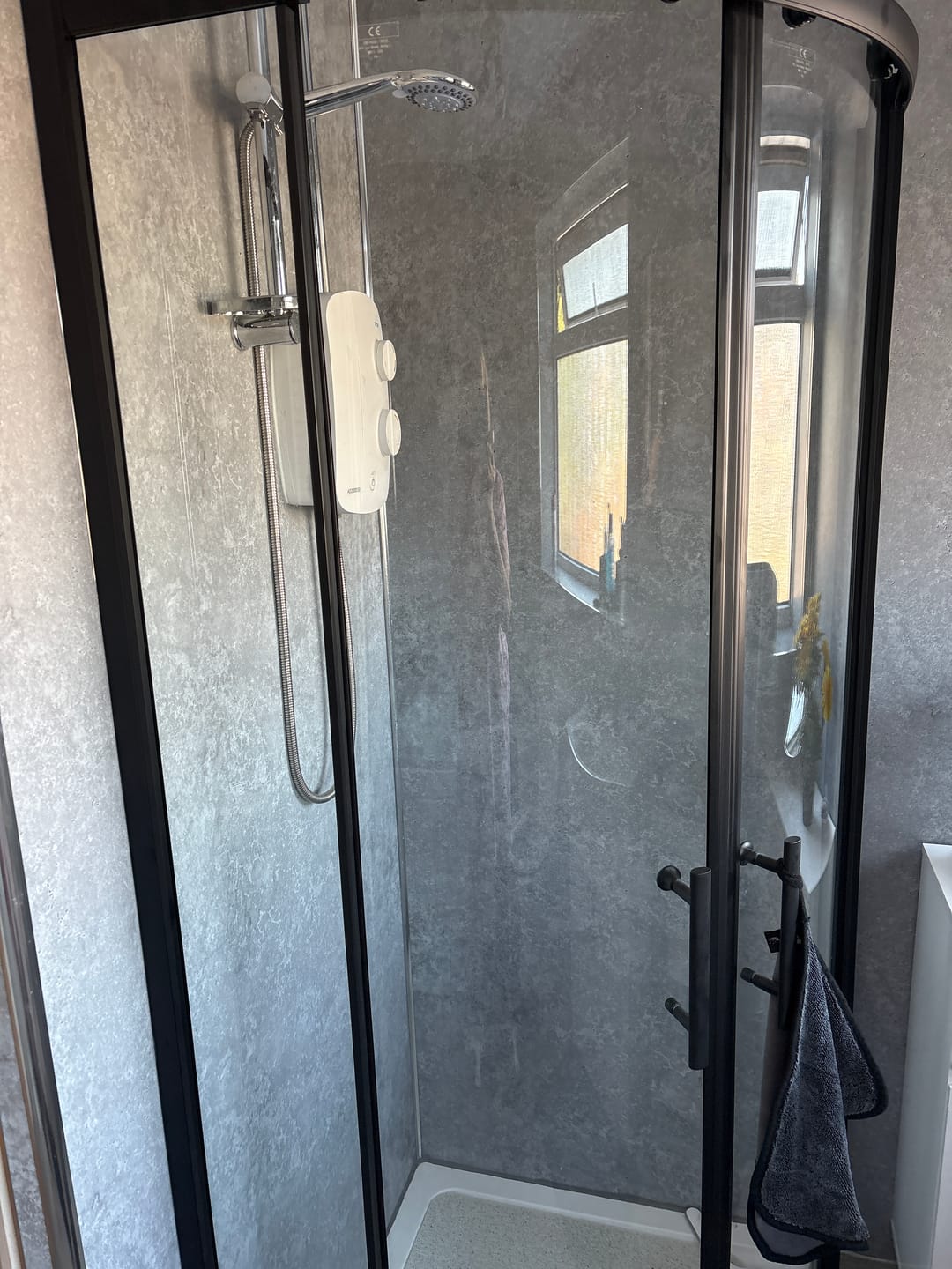 Customer photo review of Premium Grey Concrete Matt Shower Wall Panel - 1M x 2.4M