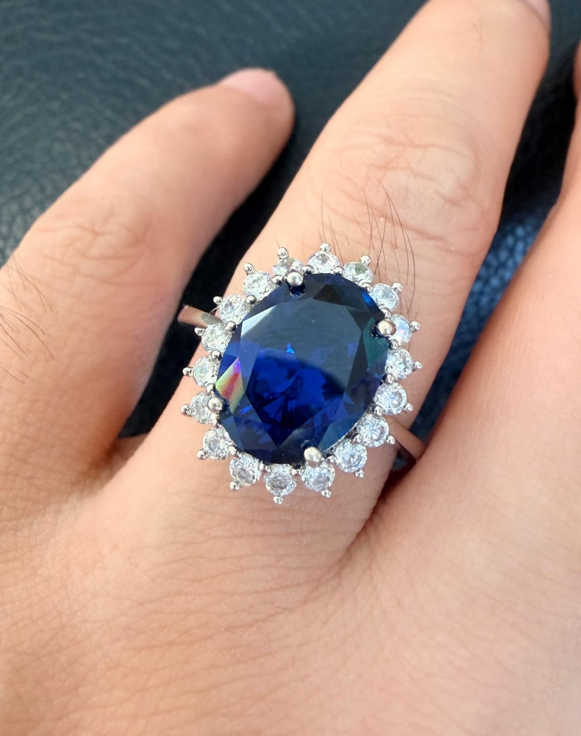Customer photo review of 4.5 Carat Halo Oval Cut Blue/Red/Green/Yellow Sapphire Engagement Ring In Sterling Silver