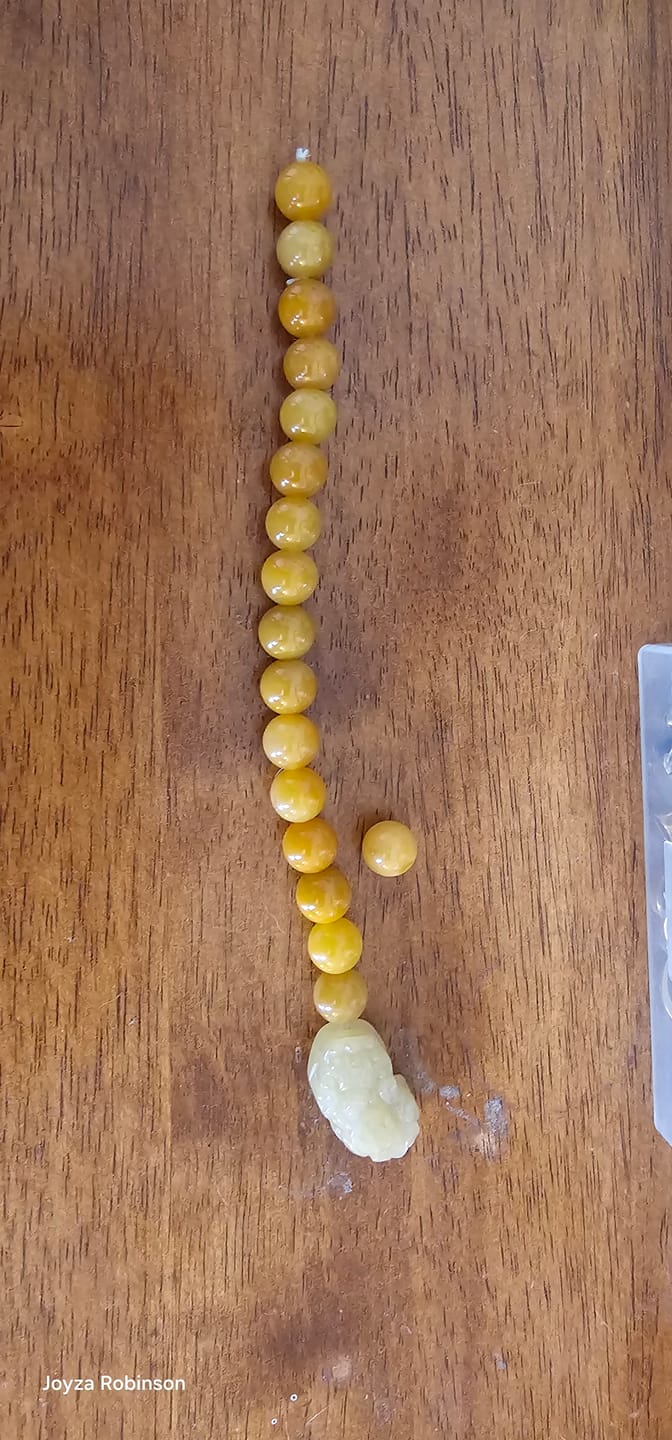 Customer photo review of Wealth Guarding Pixiu Golden Silk Jade Bracelet