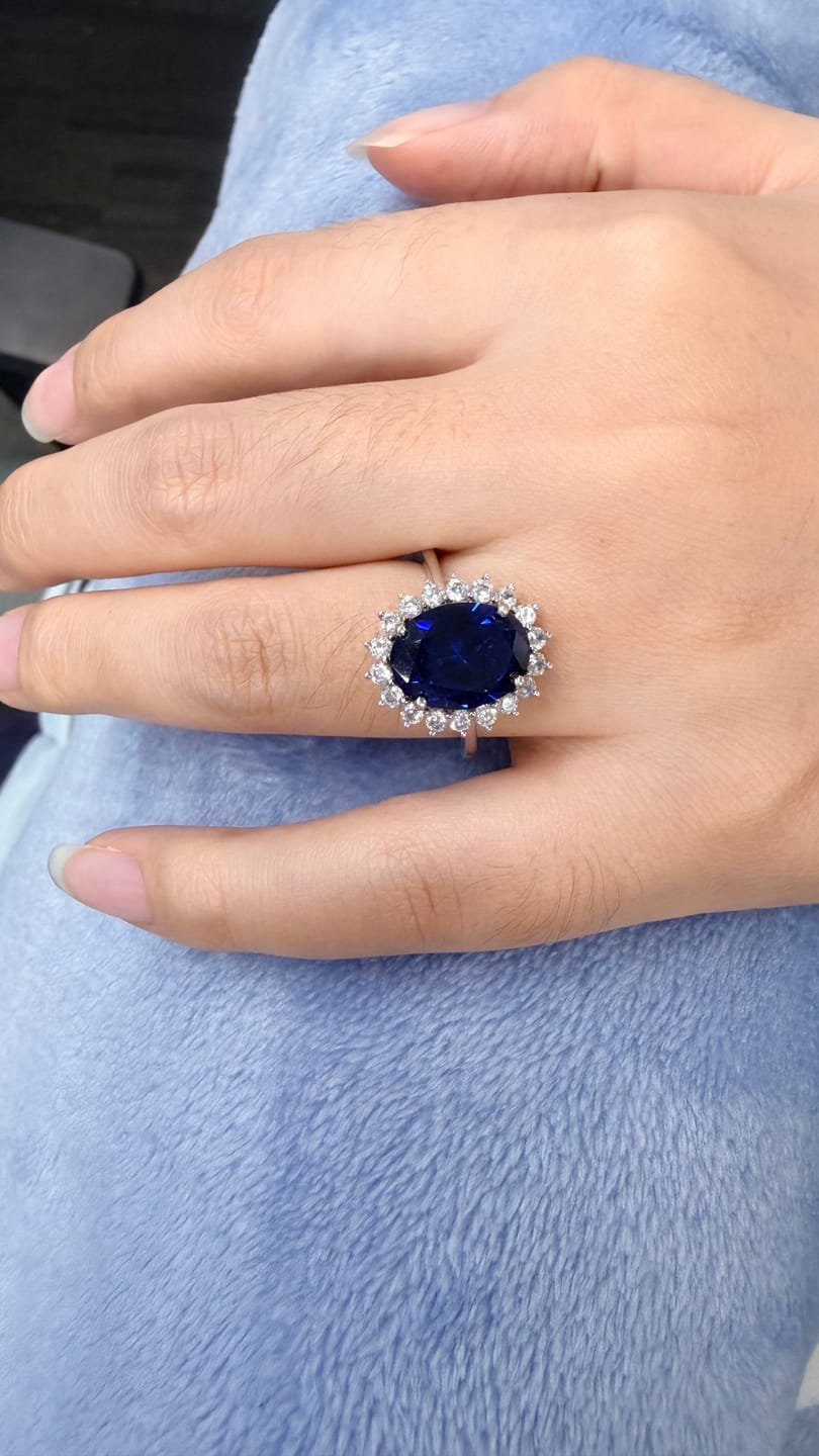 Customer photo review of 4.5 Carat Halo Oval Cut Blue/Red/Green/Yellow Sapphire Engagement Ring In Sterling Silver