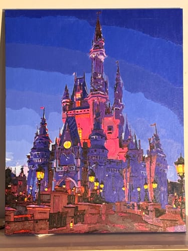 Customer's Custom Paint By Numbers canvas showing a completed, colorful fairy tale castle at night.