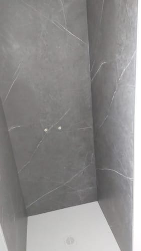 Customer photo review of Panneaux Muraux Marbre SPC Anthracite Mat – Imperméable Salle de Bain
