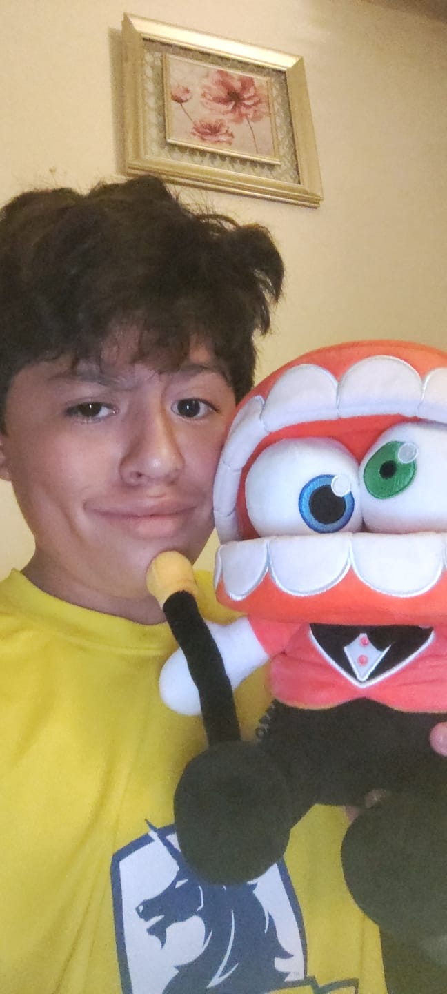 Customer photo review of Caine Plush