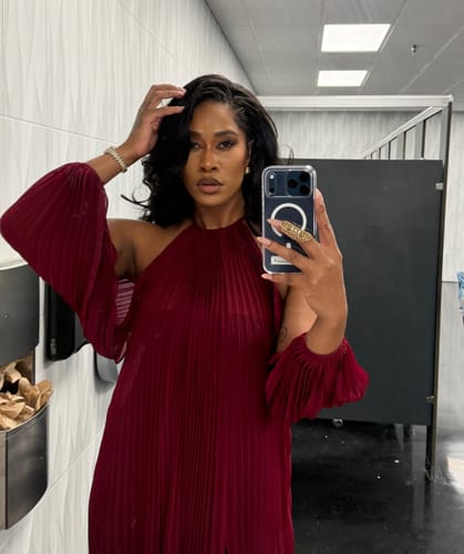 Customer's wine-colored Chiffon Pleated Gown, worn with a halter-neck design in a restroom mirror selfie.