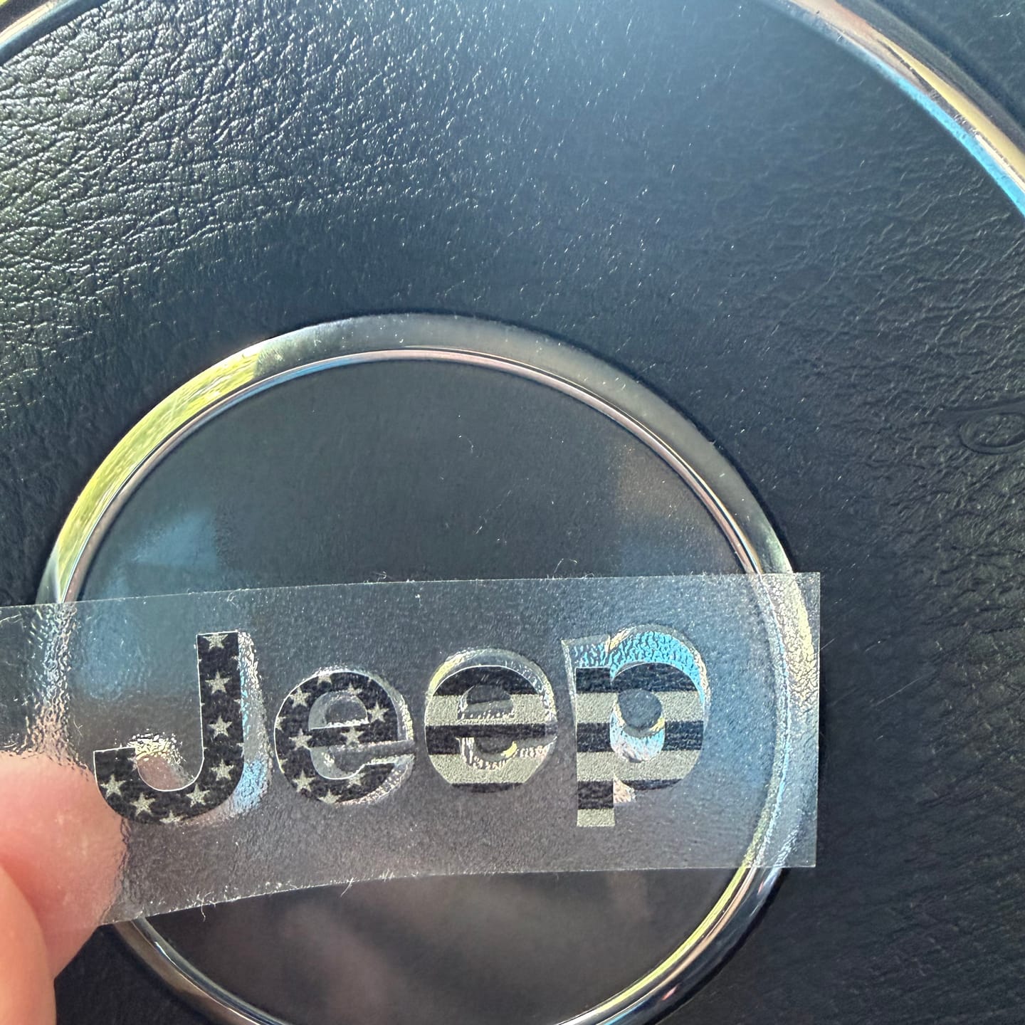 Customer photo review of JEEP Steering Wheel Emblem Overlay Decal — 30+ Colors & Designs (Flag, Topo, Animal, Solid)
