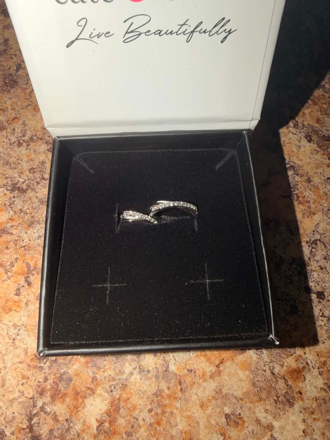 Customer photo review of Amaya 18k White Gold Plated 16mm Twisted Hoop Earrings with Swarovski Crystals