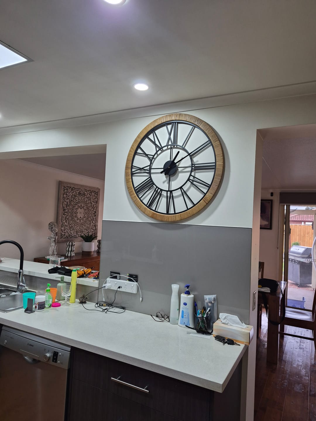 Customer photo review of Hugo French Country Wall Clock, Rattan-Wrapped Frame with Black Iron Roman Numerals 76.5cm