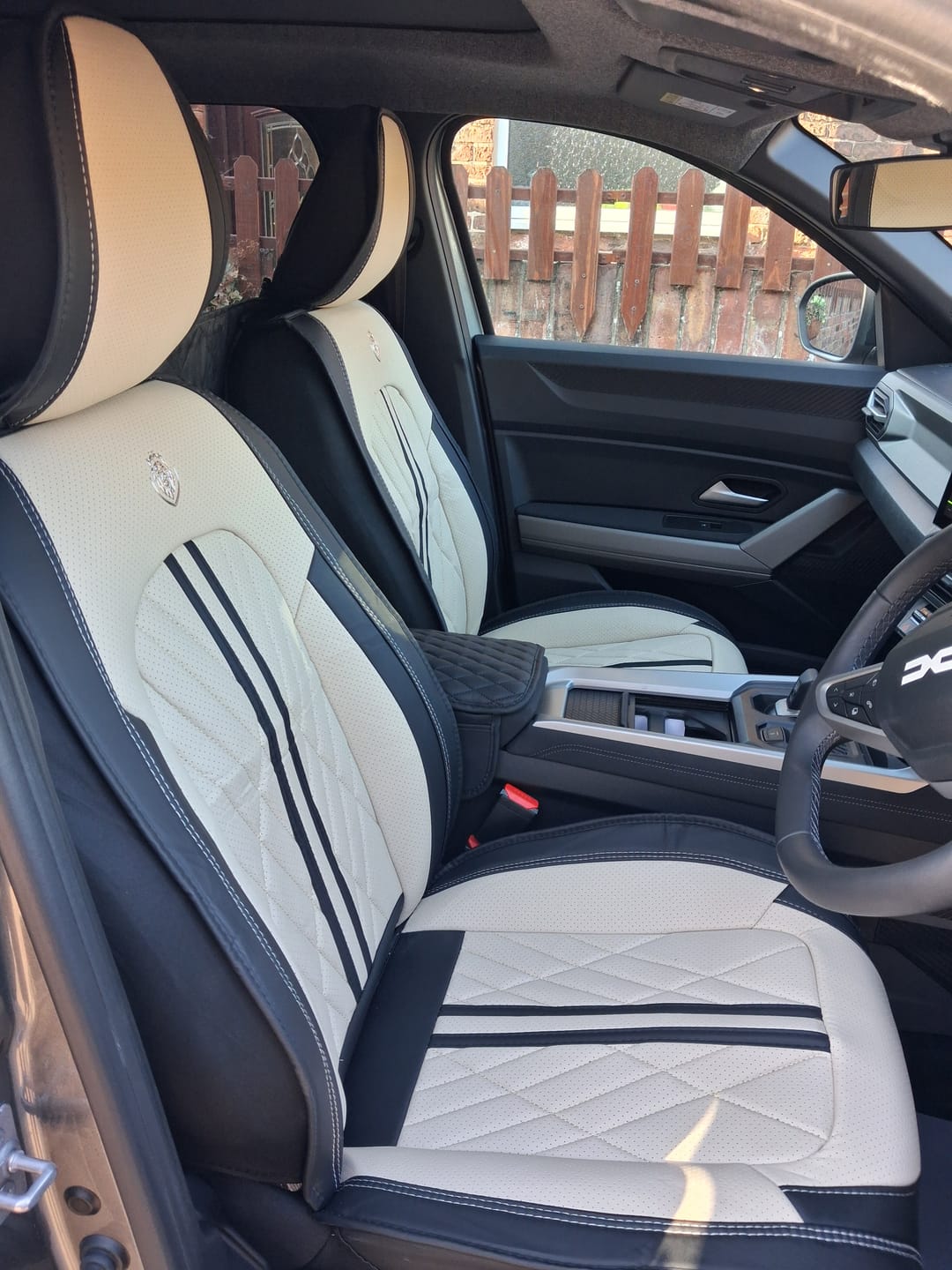 Geoff W.'s car with Beige & Black seat covers