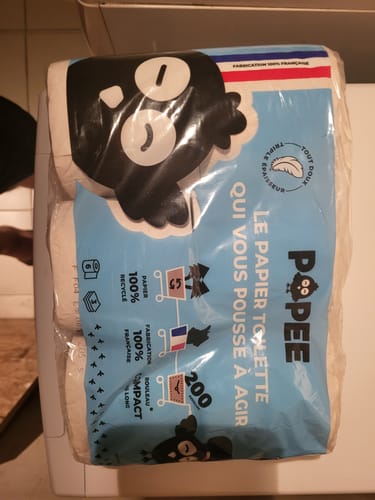Customer's pack of Popee toilet paper showing blue plastic packaging with cartoon logo and branding details.