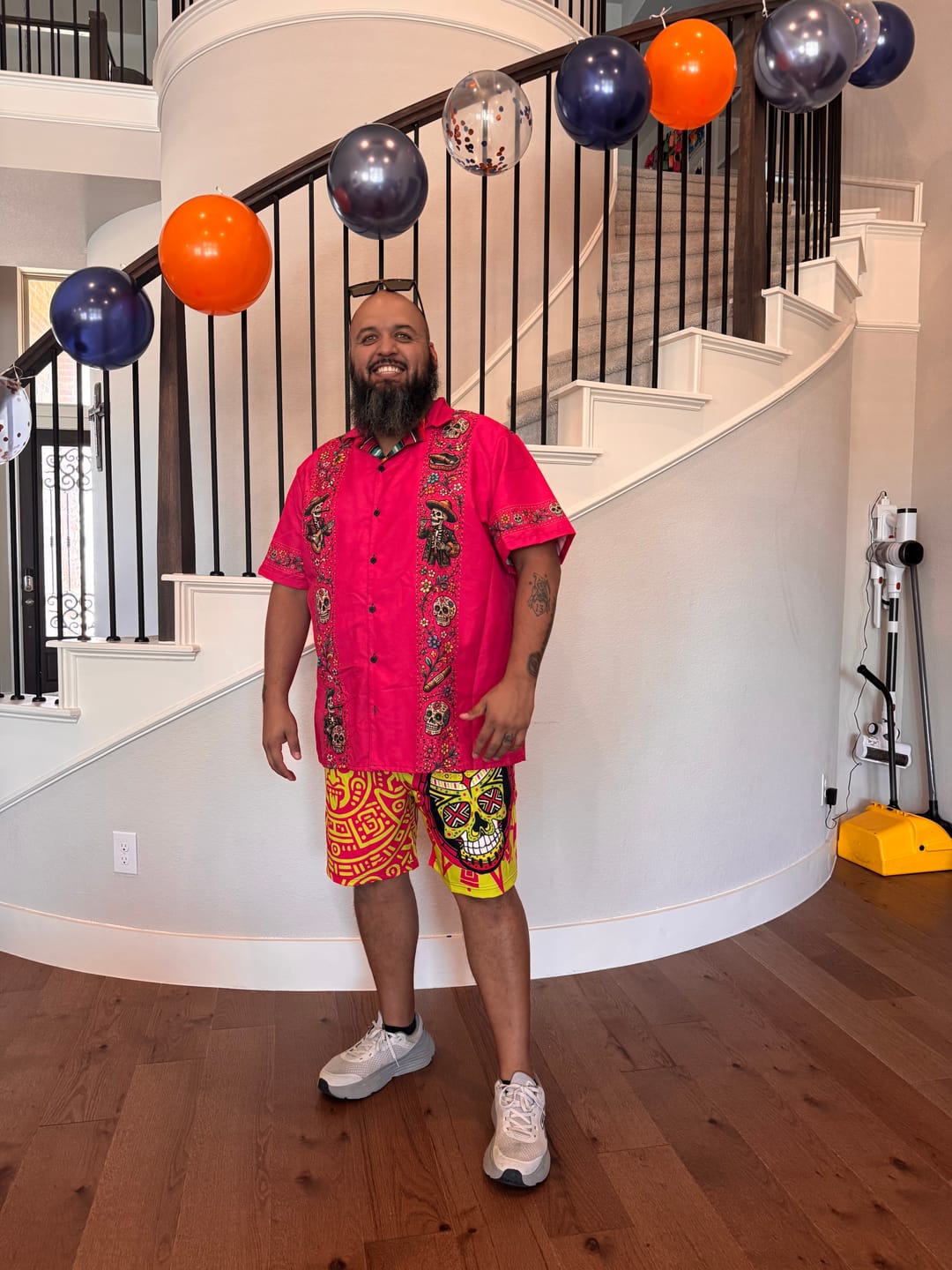 Customer photo review of Neon Xiuhpohualli Calaca Board Shorts