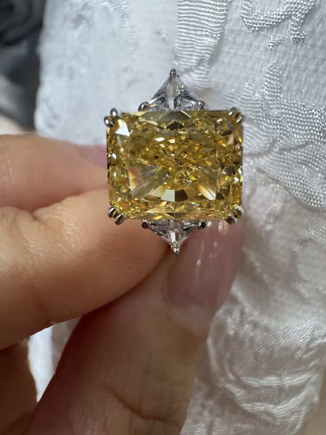 Customer photo review of S925 4.0Ct Radiant & Triangle Cut Yellow Stone Three Stone Engagement Ring In Sterling Silver