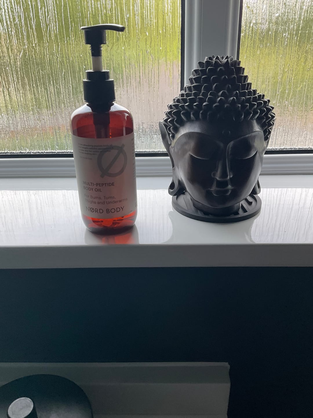 Customer photo review of NØRD BODY Peptide Body Oil