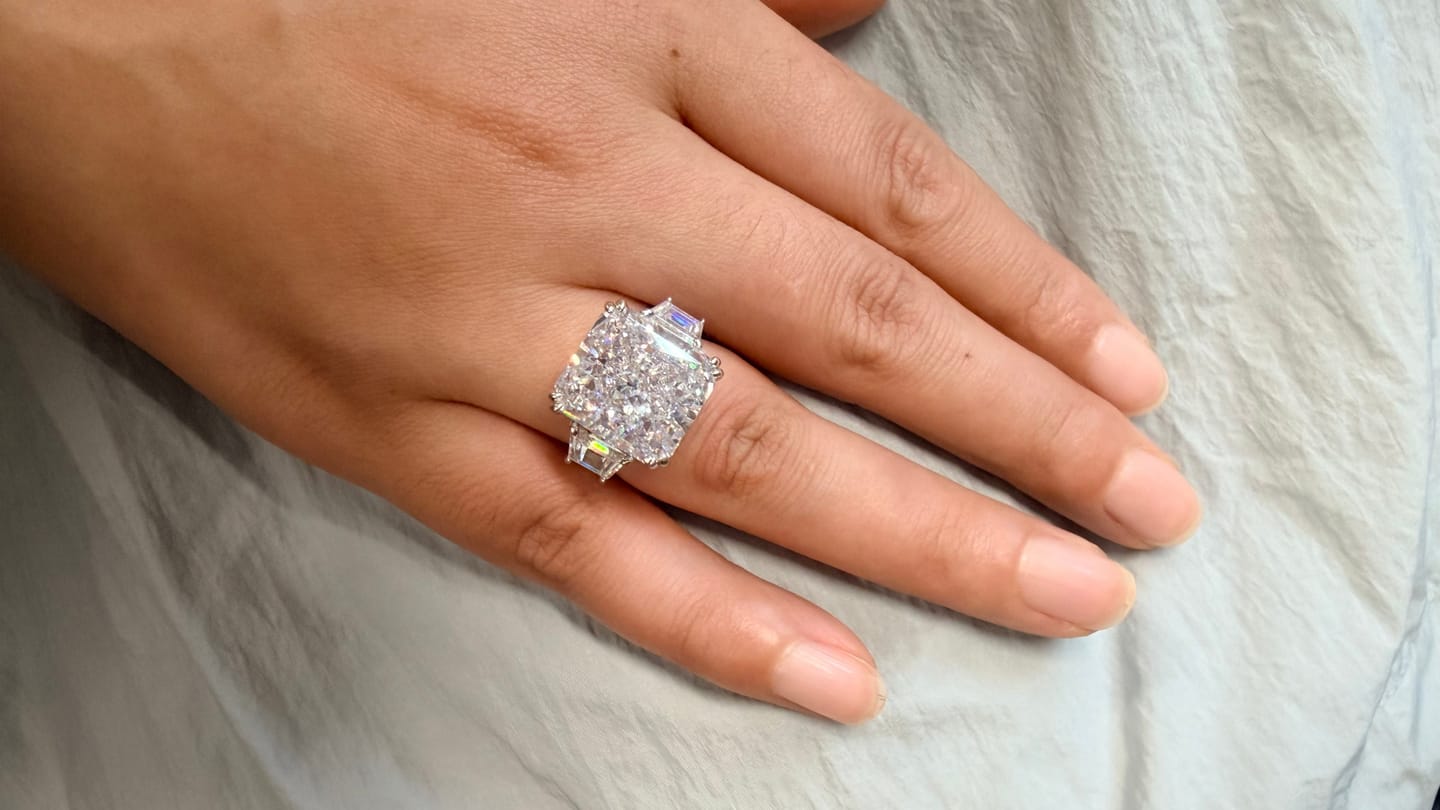 Customer photo review of S925 6.5/12.0 Ct Radiant Cut Crushed Ice Simulated Diamond Three-Stone Engagement Travel Ring