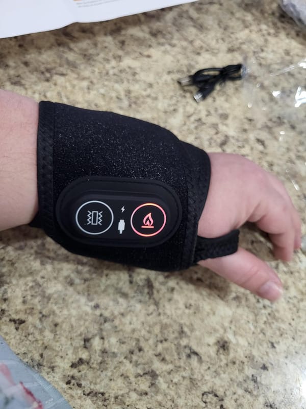 Customer photo review of ZyaVie™ 3-in-1 Red Light Wrist Wrap