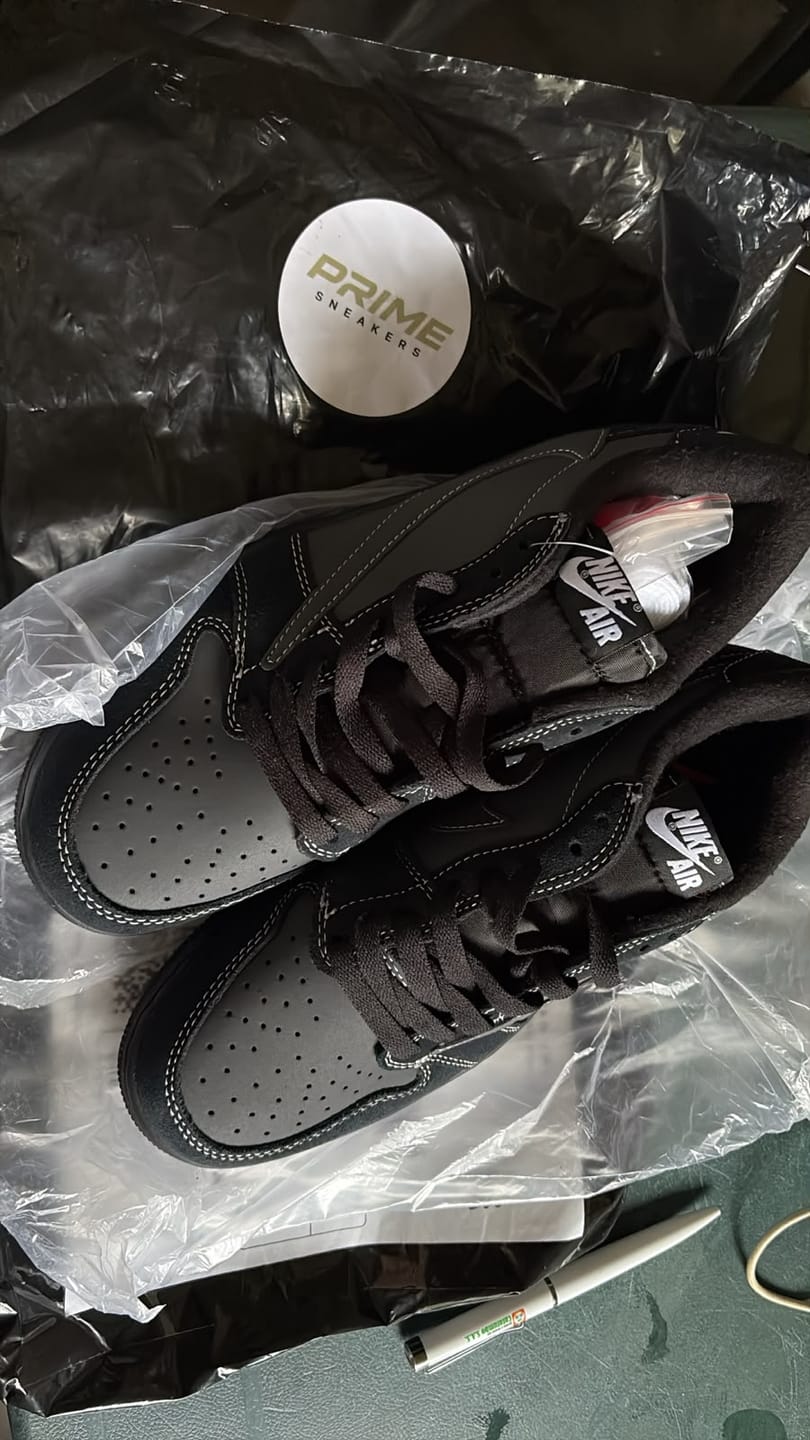 Customer photo review of JORDAN 1 LOW - TRAVIS SCOTT
