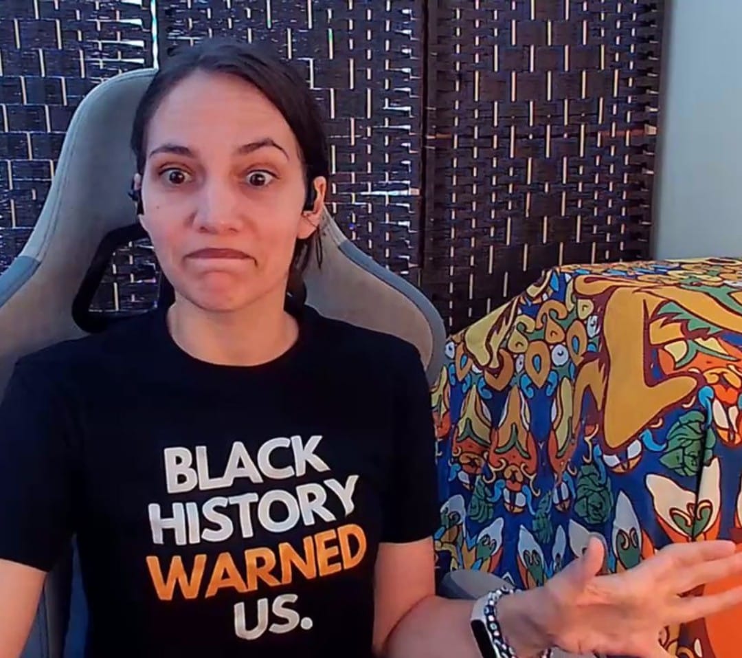 Customer photo review of Black History Warned Us Unisex T-Shirt