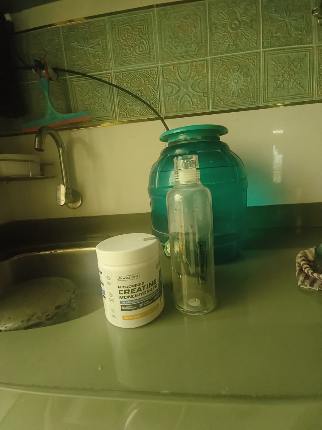 Customer photo review of Wellcore - Micronised Creatine Monohydrate (83 Servings, Tropical Tango) + Premium Glass Bottle