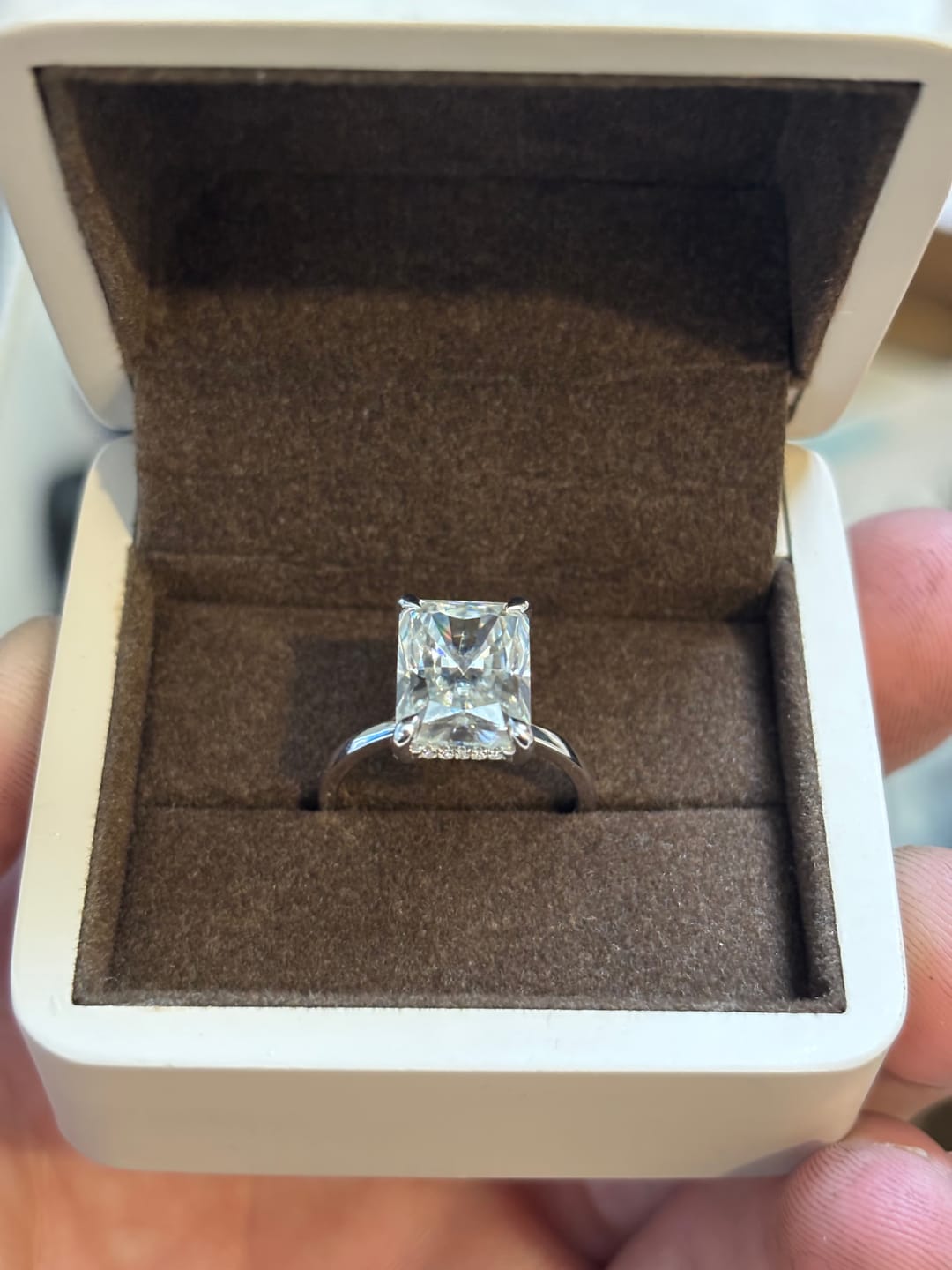 Customer photo review of Cathy 5 Carat Radiant Cut Hidden Halo Moissanite Engagement Ring in 14k White Gold