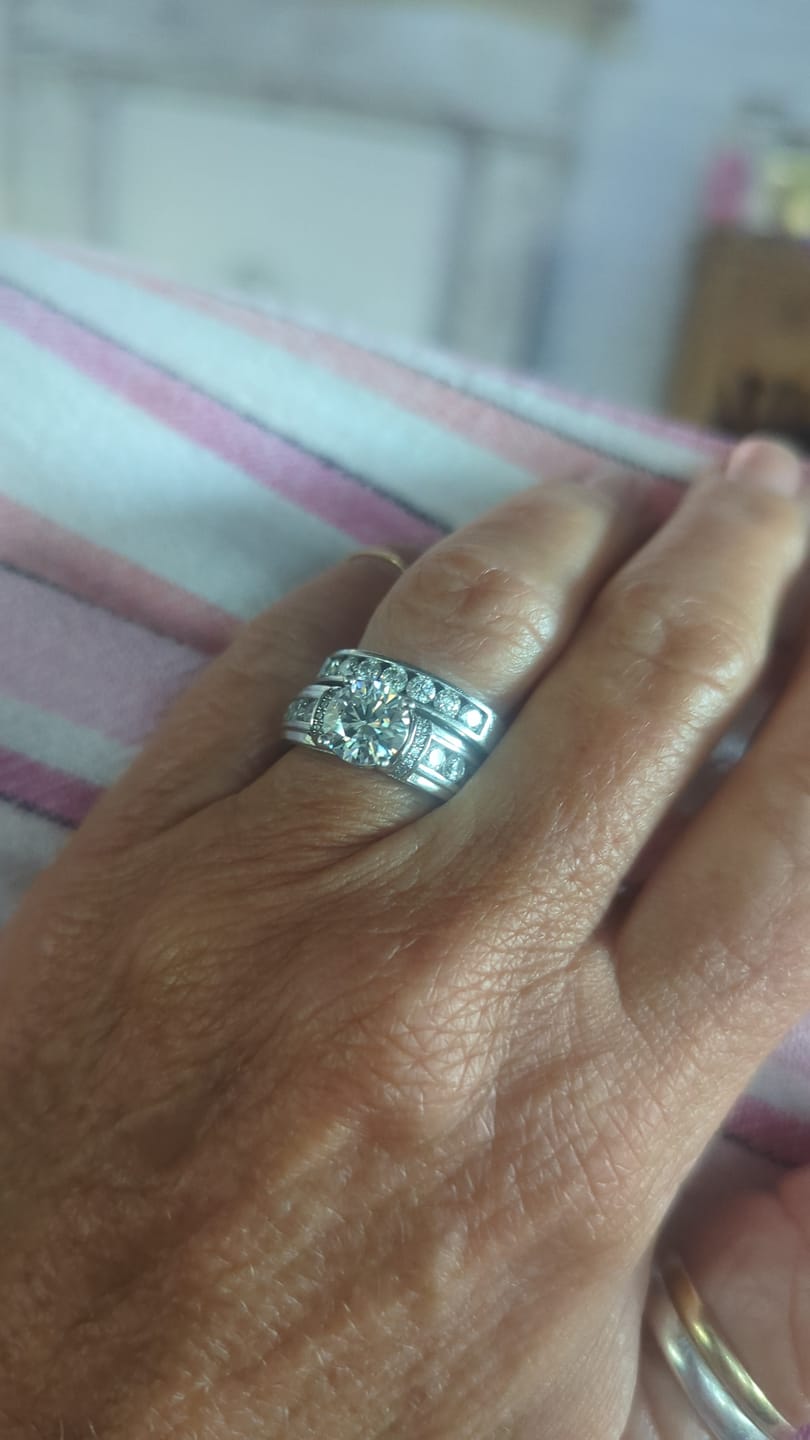 Customer photo review of Channel Set Moissanite Half Eternity Wedding Band Ring In Sterling Silver