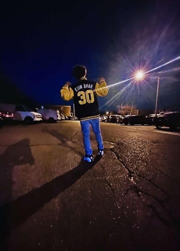 Customer photo review of Custom Black Gold Letterman Jacket with Contrast Sleeves Varsity Full-Snap