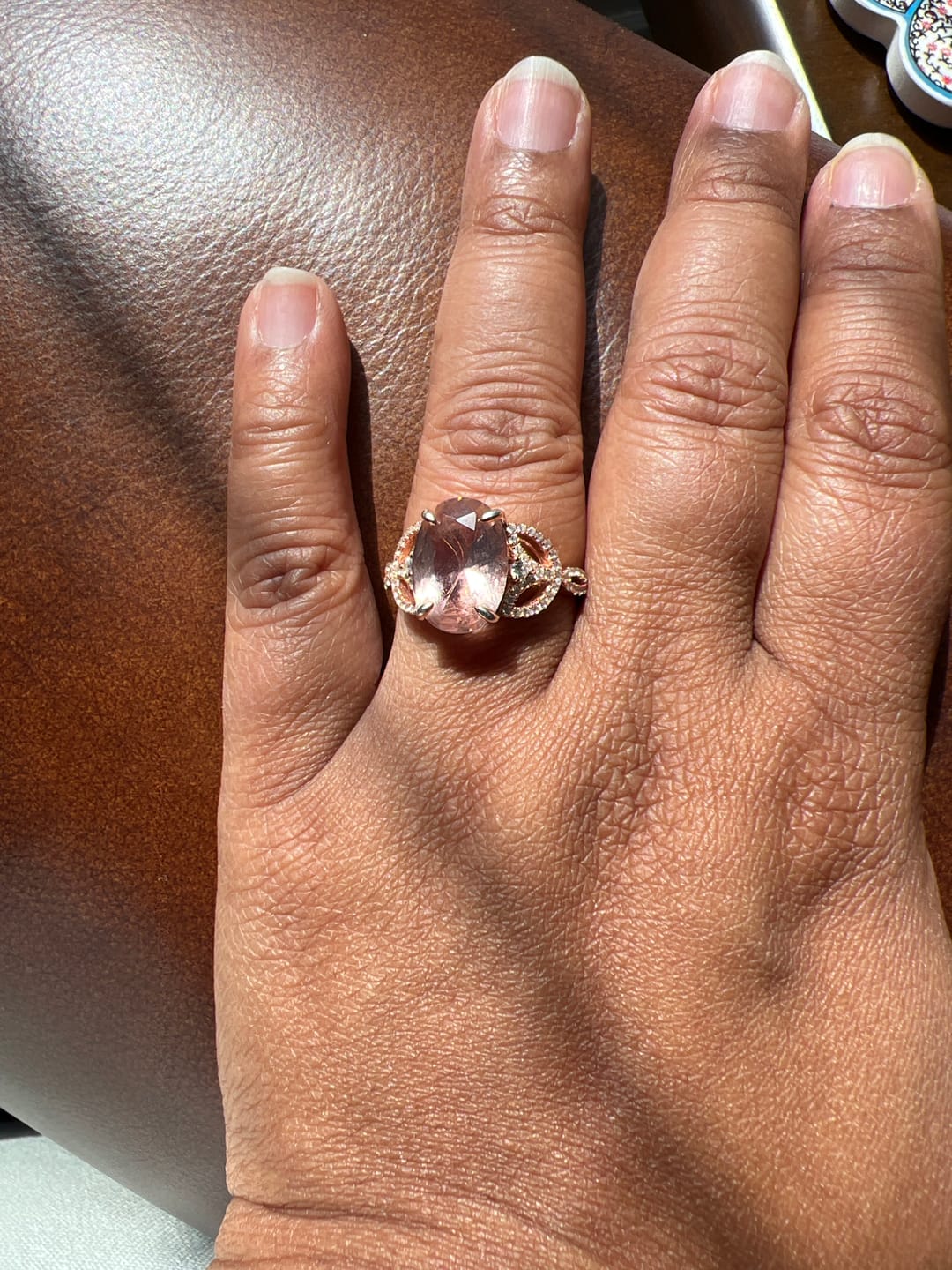 Customer photo review of Oval Cut Pink Sapphire Leaf Accents Sterling Silver Ring