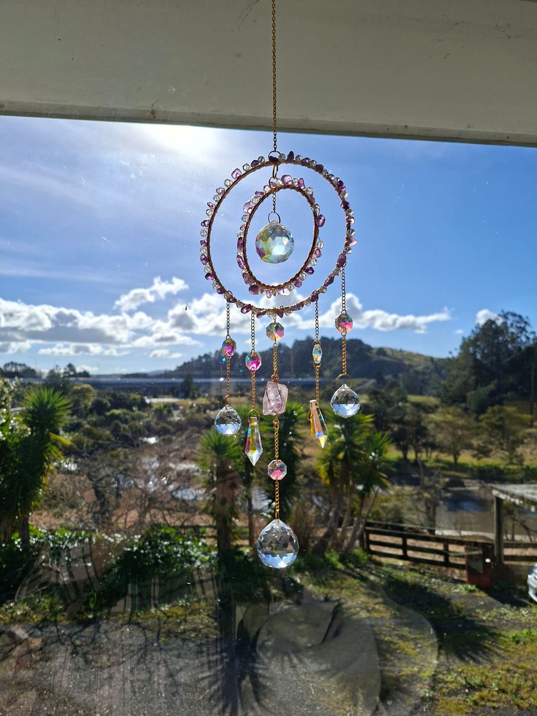 Customer photo review of Calm & Peace Double Hoop Suncatcher