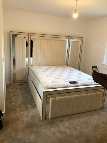 Customer photo review of Windsor Wide Extended Headboard Mirror Stripe Panelled Bed