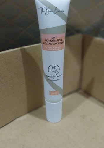 Customer's Lip Pigmentation Advanced Cream tube standing upright on a flat surface.