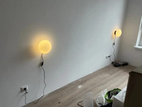 Customer photo review of OpalHalo Nordic White Glass Orb Wall Sconce