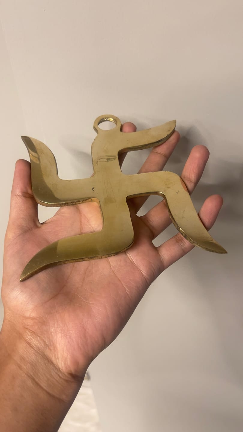 Customer photo review of Brass Swastik Wall Symbol | Vastu Remedy for Main Entrance & Auspicious Energy | 5 & 9 Inch