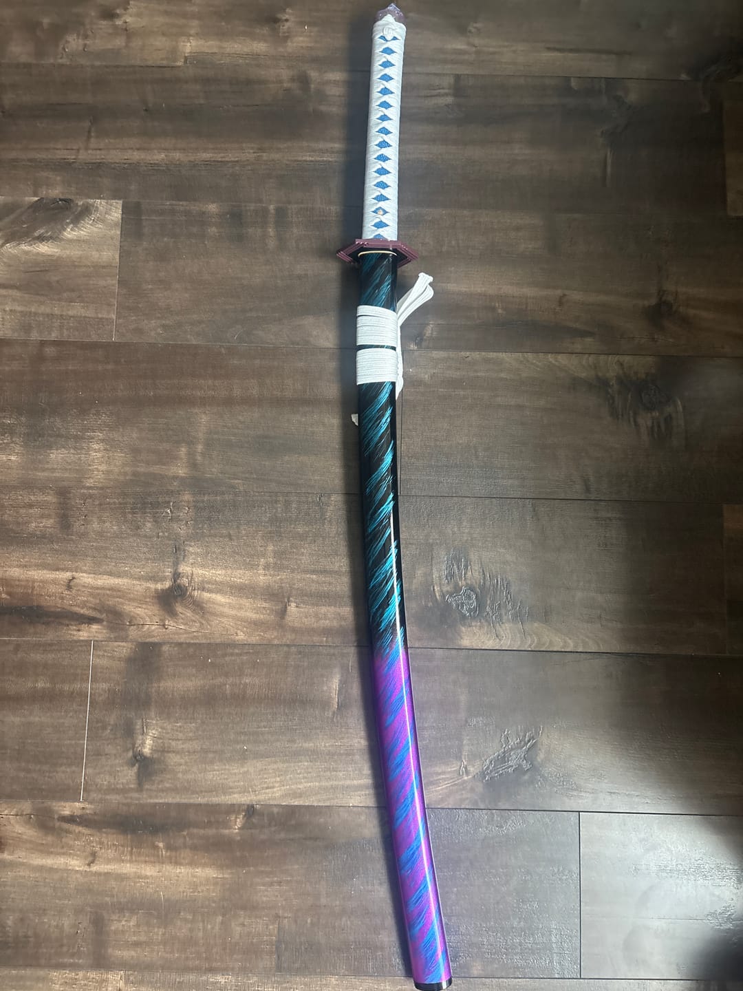 Customer photo review of The Giyuu Tomioka Handmade Katana Clay Tempered T10 Steel From Demon Slayer